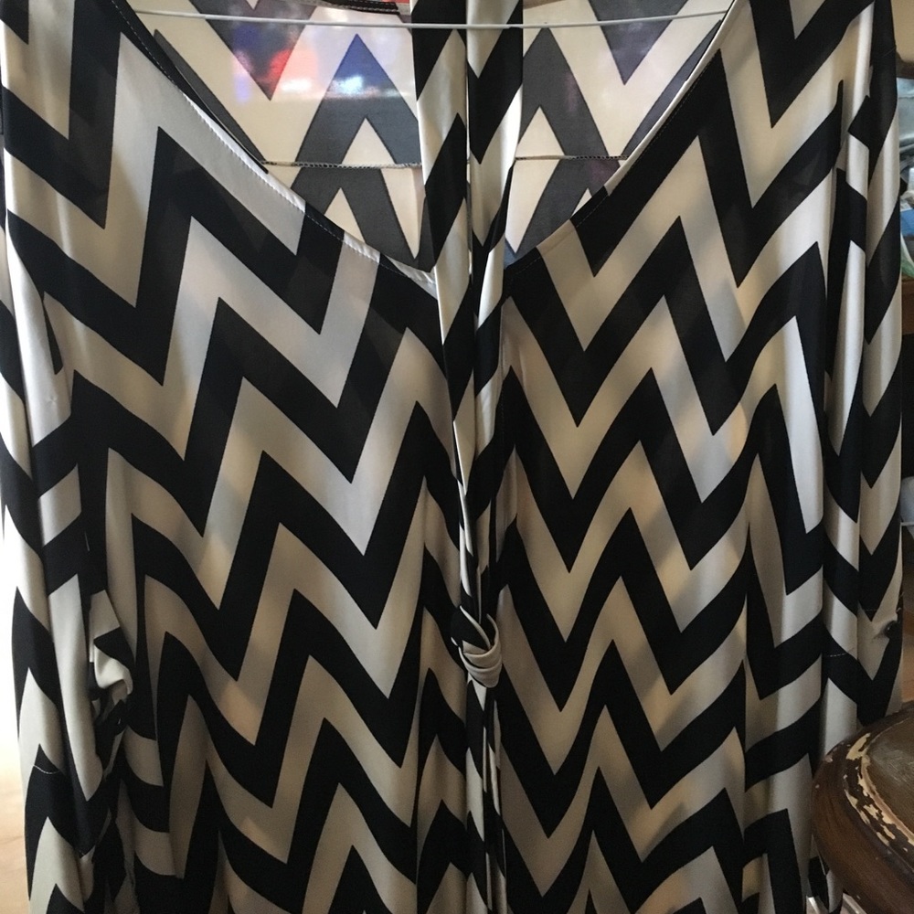 Dress with chevron design and sash